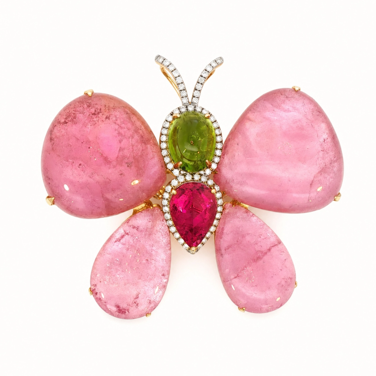 Butterfly brooch with pink tourmaline cabochon wings, a green tourmaline body, and a pear-cut rubellite center framed in diamonds, in yellow gold.