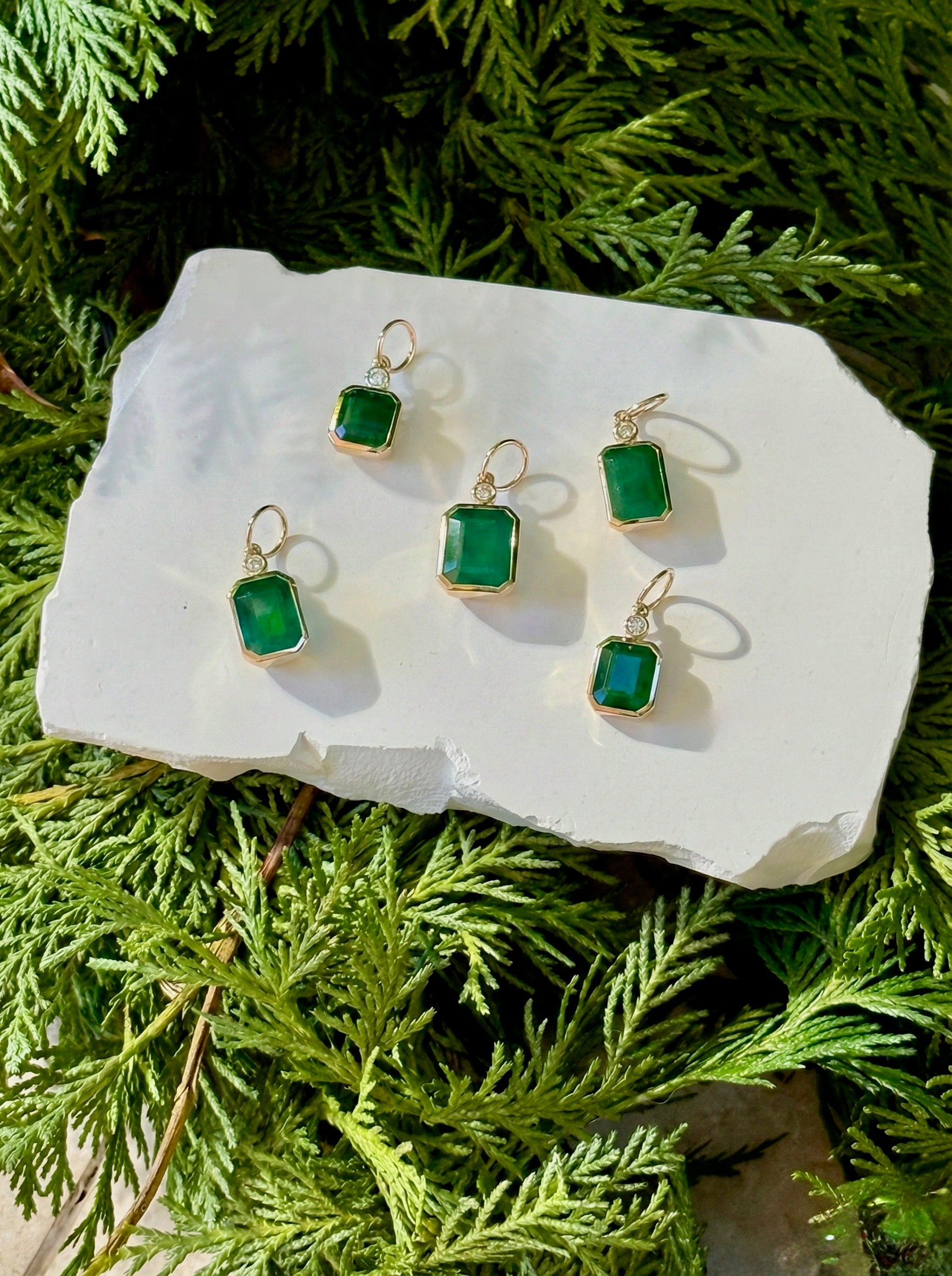 Bezel Set Zambian Emerald Pendants by Elyizan
