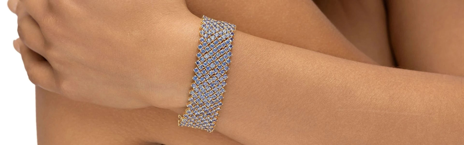 Elyzian diamond lattice mesh bracelet on wrist, geometric luxury fine jewelry minimalist styling