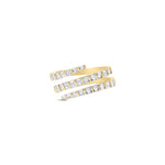 Modern wrap-around ring crafted in 14K yellow gold, featuring dazzling illusion-set baguette diamonds with clean lines and elegant craftsmanship, making it a versatile and stackable jewelry piece. Front close up. 