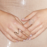 Graceful diamonds and gold rings on model. 