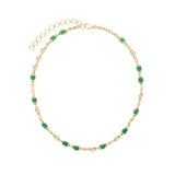 Handmade 14K yellow gold adjustable rolo chain necklace featuring 13 bezel-set emerald cut Zambian emeralds (6.12ct) and 10 bezel-set solitaire diamonds (1.74ct), offering refined elegance with a bold touch.