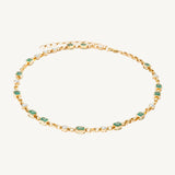 Handmade 14K yellow gold adjustable rolo chain necklace featuring 13 bezel-set emerald cut Zambian emeralds (6.12ct) and 10 bezel-set solitaire diamonds (1.74ct), offering refined elegance with a bold touch.
