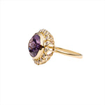 Stunning 14K yellow gold cocktail ring featuring an 8.65ct amethyst center stone surrounded by a sparkling diamond halo in an elegant basket setting, perfect for bold gemstone lovers.