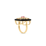 Celestial Art Deco starburst ring featuring a radiant ruby centerpiece framed by a bold onyx setting and intricate diamond accents, all set in 14K yellow gold for a dazzling vintage statement. Side view.
