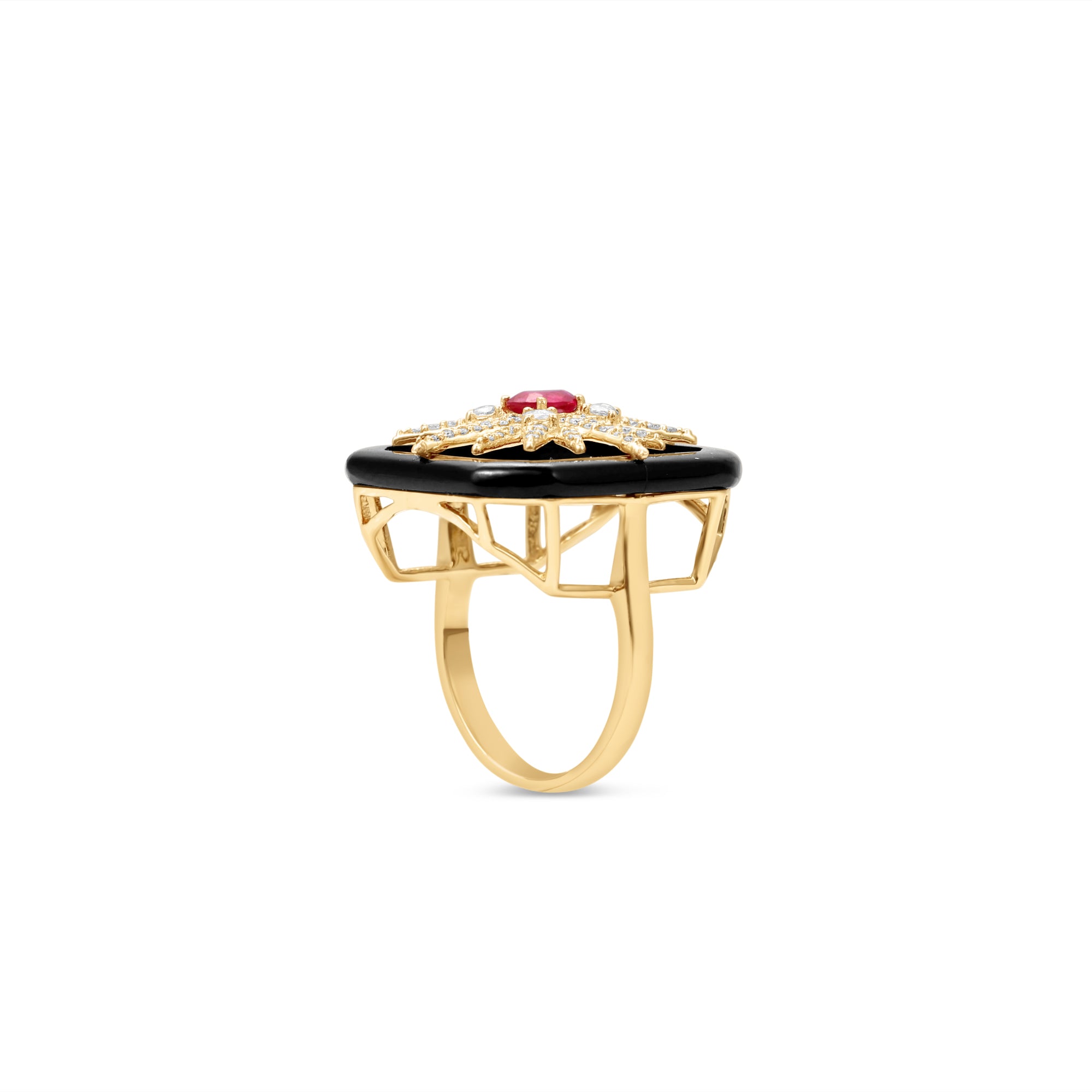 Celestial Art Deco starburst ring featuring a radiant ruby centerpiece framed by a bold onyx setting and intricate diamond accents, all set in 14K yellow gold for a dazzling vintage statement. Side view.