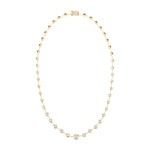 Stunning 14K yellow gold articulating diamond necklace featuring over 10.5ct of mixed-shape diamonds, including a 1.5ct antique cushion-cut center stone, 22 round bezel-set diamonds, and an architectural clasp crowned with a 1ct solitaire diamond.