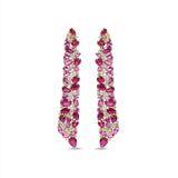Captivating statement earrings in 14K gold featuring vibrant rubies, pink sapphires, and radiant diamonds, inspired by the fiery hues of dawn and twilight to embody passion and timeless elegance. Front Close Up