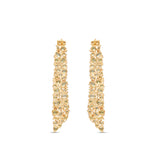 Statement 14K yellow gold earrings featuring hand-selected yellow sapphires and brilliant diamonds, radiating warmth and elegance inspired by the golden glow of sunlight.