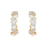 Modern 14K yellow gold huggie earrings featuring a staggered stack design with 26 baguette-cut G-H VS diamonds per hoop (1.16ct total), secured with a lever back closure—perfect for everyday elegance.