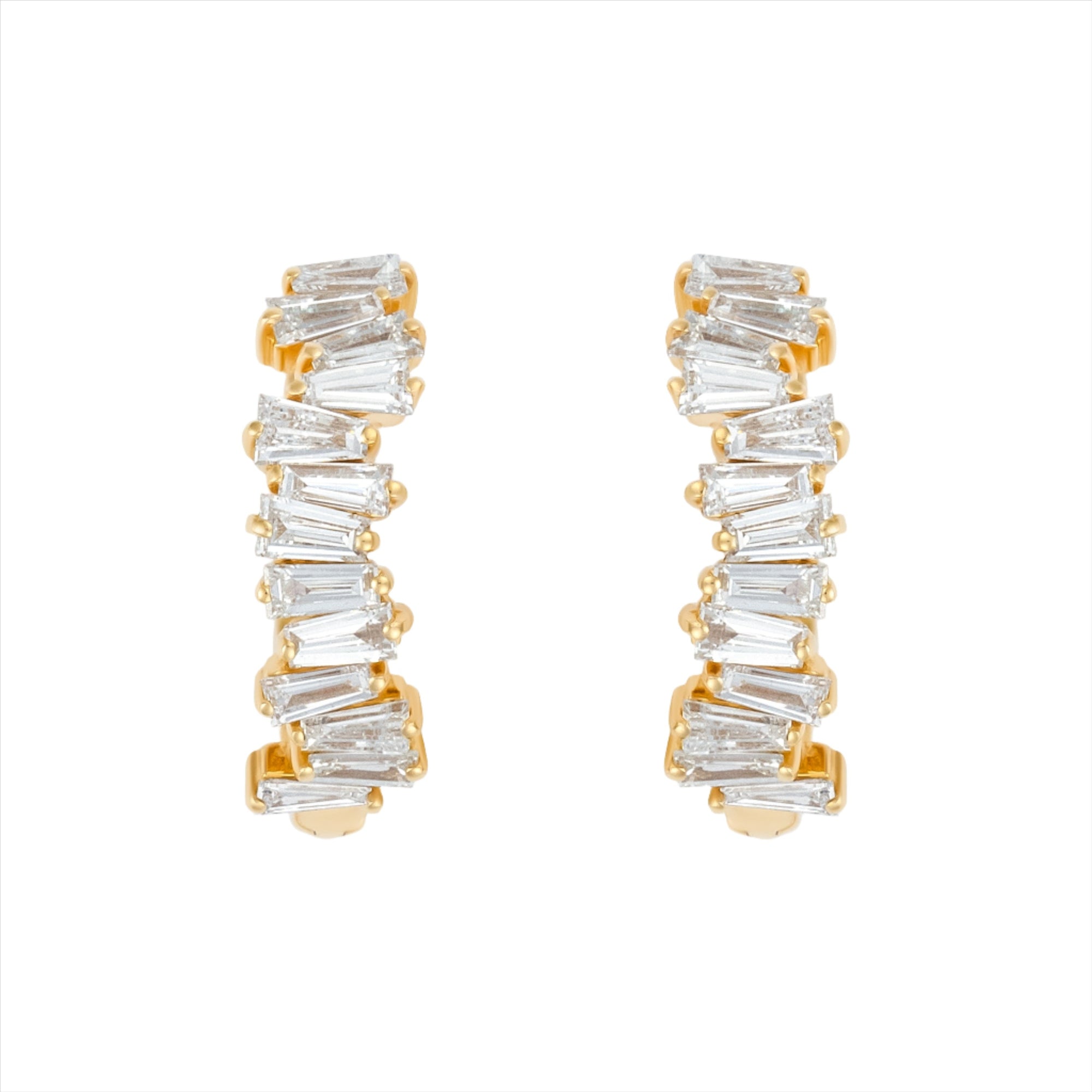 Modern 14K yellow gold huggie earrings featuring a staggered stack design with 26 baguette-cut G-H VS diamonds per hoop (1.16ct total), secured with a lever back closure—perfect for everyday elegance.