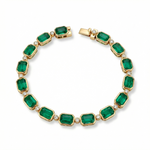 One-of-a-kind 14K yellow gold cocktail tennis bracelet featuring 20.3ct of natural Zambian emeralds accented with 0.70ct of round bezel-set diamonds. Total length: 7.5 inches, total weight: 18.95g—a bold and luxurious gemstone statement.