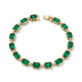 One-of-a-kind 14K yellow gold cocktail tennis bracelet featuring 20.3ct of natural Zambian emeralds accented with 0.70ct of round bezel-set diamonds. Total length: 7.5 inches, total weight: 18.95g—a bold and luxurious gemstone statement.
