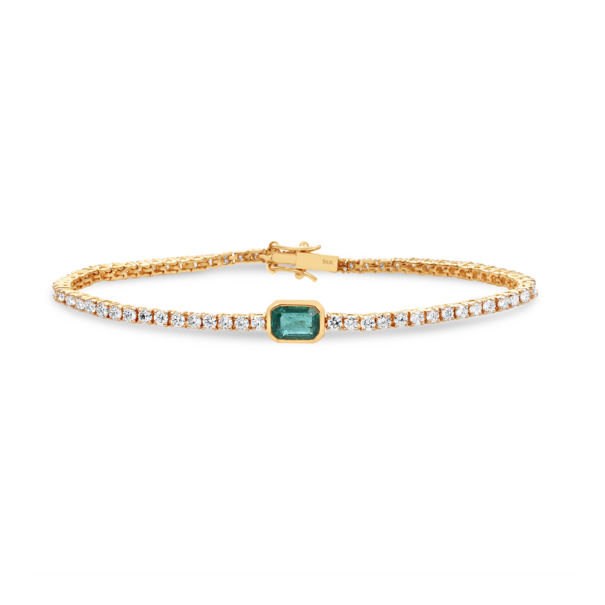 Elegant 14K gold tennis bracelet featuring bezel-set diamonds and a vibrant emerald centerpiece, combining timeless sophistication with luxurious craftsmanship.