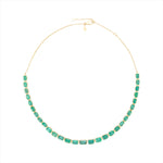 Adjustable 14K yellow gold necklace featuring 38.87 carats of natural, unheated Zambian emeralds in bezel settings, with the largest stone measuring 8.4mm x 6.1mm, offering vibrant green luxury and timeless elegance.