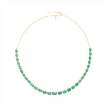 Adjustable 14K yellow gold necklace featuring 38.87 carats of natural, unheated Zambian emeralds in bezel settings, with the largest stone measuring 8.4mm x 6.1mm, offering vibrant green luxury and timeless elegance.