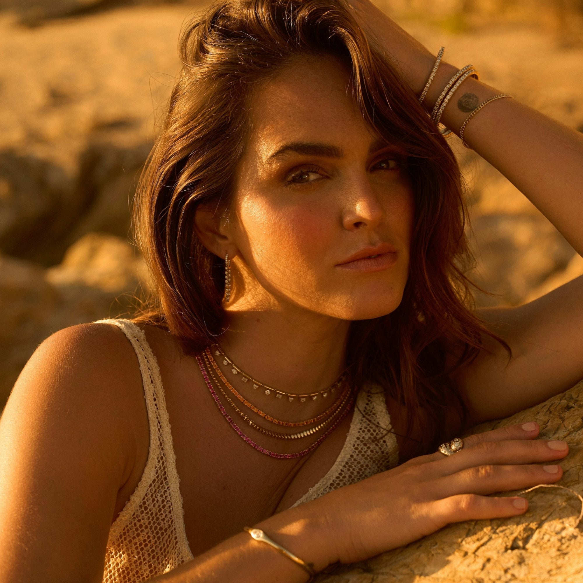 Luxurious 14K yellow gold necklace featuring 3.36ct of bezel-set fancy mixed-shape diamonds, elegantly designed with an adjustable length from 16 to 18 inches for versatility and timeless sophistication. On model. 