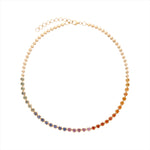 Exquisite 14K yellow gold necklace featuring 11.50ct of bezel-set multicolored hexagon-cut sapphires, finished with gold beads and an adjustable 16–18 inch length for a truly unique, forever piece.
