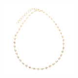 Elegant 14K yellow gold necklace featuring 5ct of bezel-set mixed-shaped diamonds with an adjustable length from 16 to 18 inches, offering a timeless and refined sparkle.