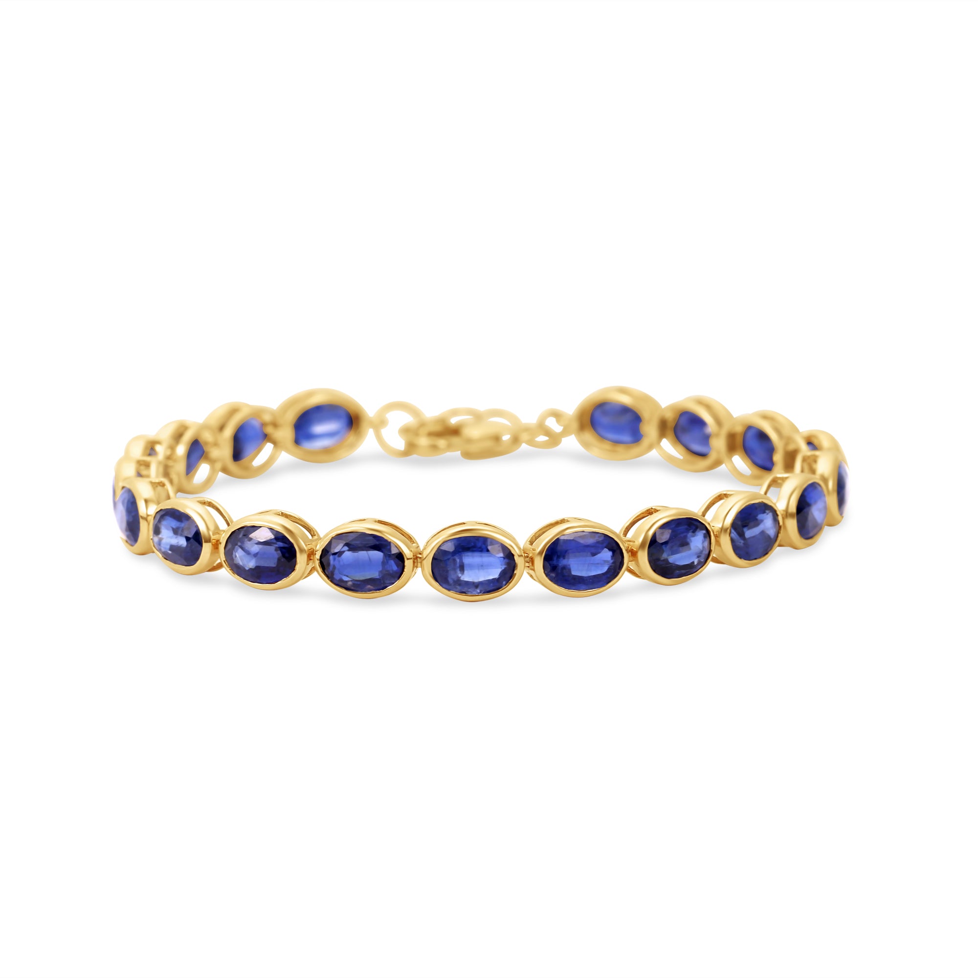 Luxurious 14K gold tennis bracelet featuring bezel-set oval-cut blue sapphires, exuding timeless elegance and vibrant sophistication.