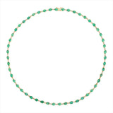  Elegant 14K yellow gold tennis necklace featuring 15.43ct of bezel-set oval-shaped Colombian emeralds and 0.93ct of sparkling solitaire diamonds, with a 17-inch length—a timeless and sophisticated gemstone statement.