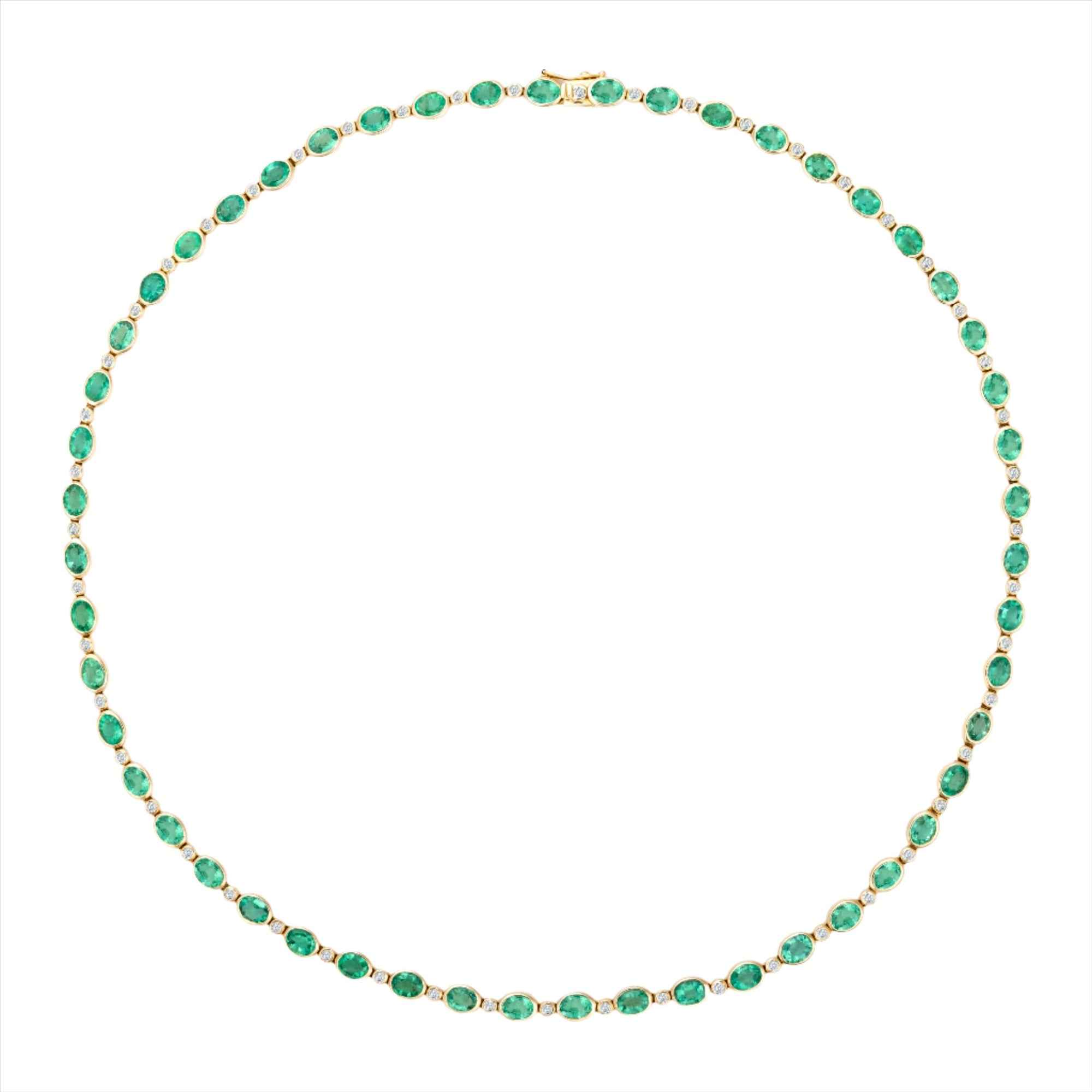  Elegant 14K yellow gold tennis necklace featuring 15.43ct of bezel-set oval-shaped Colombian emeralds and 0.93ct of sparkling solitaire diamonds, with a 17-inch length—a timeless and sophisticated gemstone statement.