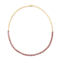 Luxurious 14K yellow gold tennis necklace featuring 10.14ct of bezel-set emerald cut pink sapphires, 16 inches in length and weighing 25.74g—a refined and radiant statement piece.