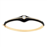 Art Deco-inspired bangle in 14K yellow gold, featuring sleek black enamel detailing and 0.48ct of sparkling diamonds. Total weight: 14.45g—an elegant blend of vintage glamour and modern edge.