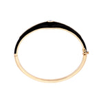 Art Deco-inspired bangle in 14K yellow gold, featuring sleek black enamel detailing and 0.48ct of sparkling diamonds. Total weight: 14.45g—an elegant blend of vintage glamour and modern edge.