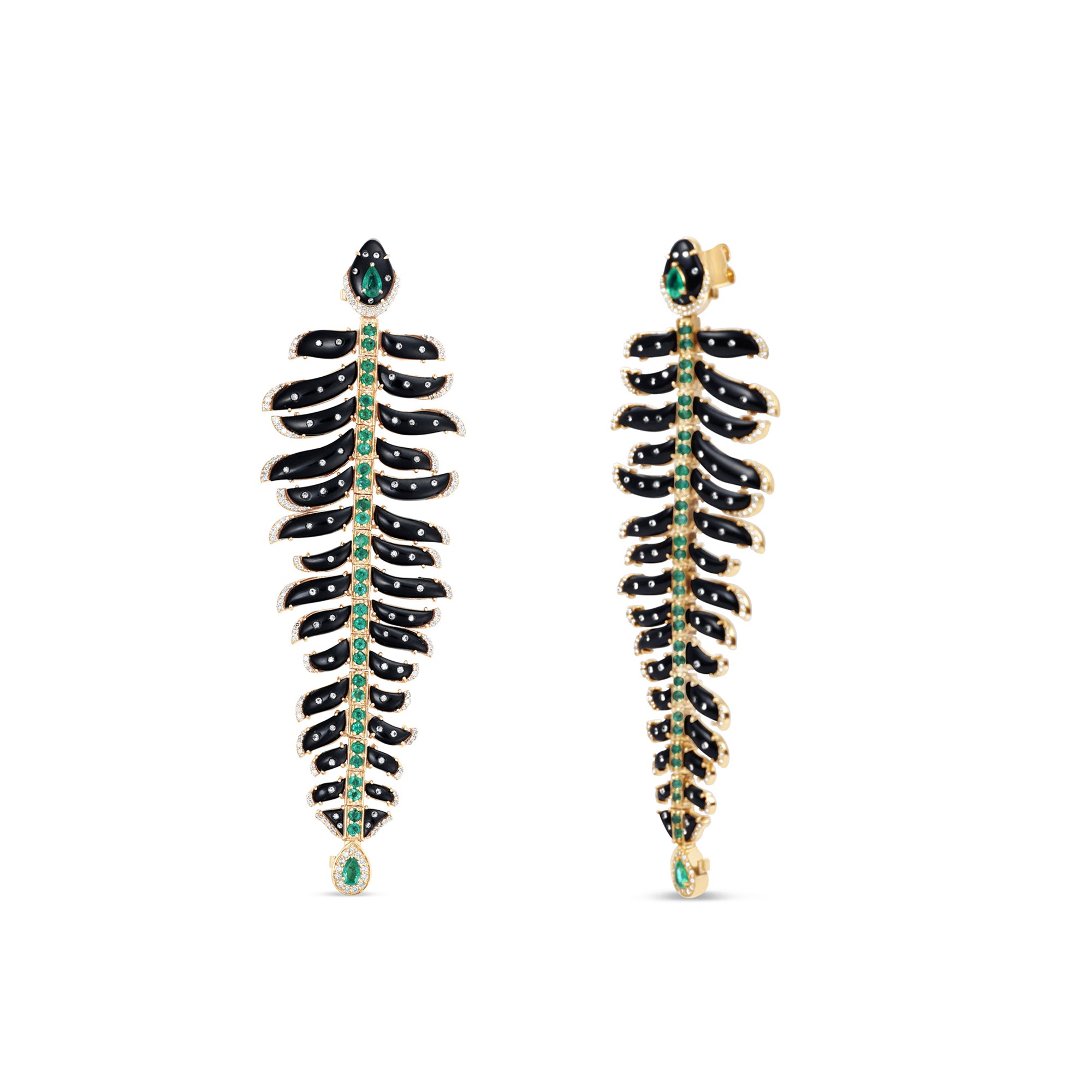 One-of-a-kind 14K yellow gold feather earrings featuring black onyx, emeralds, and diamonds, uniquely designed for versatility—wear as dramatic dangle earrings or convert into a striking feather bracelet paired with emerald studs. Shown close up as earrings.