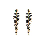 One-of-a-kind 14K yellow gold feather earrings featuring black onyx, emeralds, and diamonds, uniquely designed for versatility—wear as dramatic dangle earrings or convert into a striking feather bracelet paired with emerald studs. Shown as earrings.