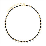 Striking black onyx and diamond tennis necklace featuring 3.46ct of mixed fancy-shaped diamonds, adjustable from 15 to 18 inches—perfectly pairs with our matching teardrop earrings.