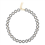 Striking 14K yellow gold chain necklace featuring bold black onyx links and pavé diamond-accented connectors, designed in a 17.5-inch length for an elegant statement look."