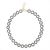Striking 14K yellow gold chain necklace featuring bold black onyx links and pavé diamond-accented connectors, designed in a 17.5-inch length for an elegant statement look."