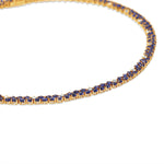 Elegant dual tennis necklace featuring deep blue sapphires and shimmering diamond accents, blending classic sophistication with modern luxury. 14K yellow Gold