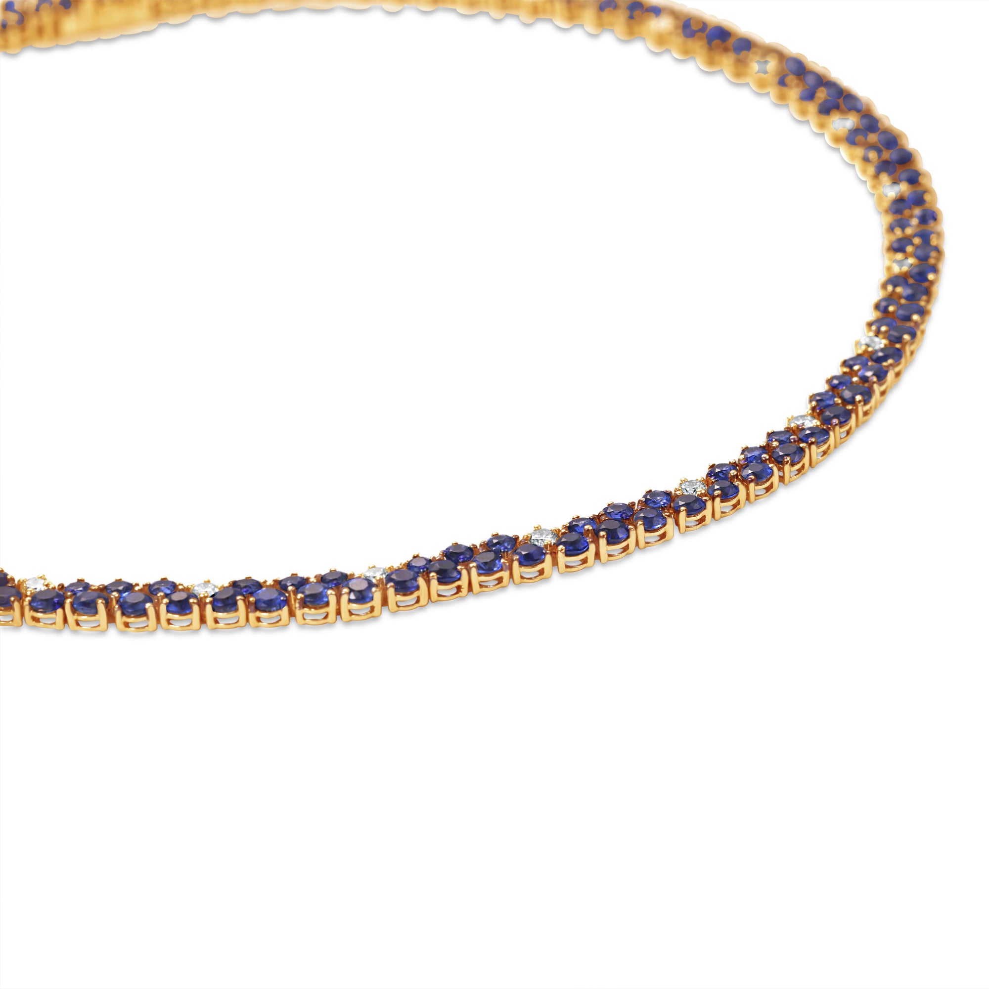 Elegant dual tennis necklace featuring deep blue sapphires and shimmering diamond accents, blending classic sophistication with modern luxury. 14K yellow Gold
