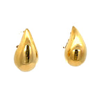 Striking 14K yellow gold teardrop earrings with a bold, oversized silhouette, crafted in semi-hollow gold for a lightweight yet statement-making design. Close up.