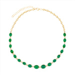 Stunning 14K yellow gold necklace featuring 28.07ct of graduated cabochon emeralds and 1.17ct of round diamonds, finished with oval gold beads and an adjustable chain from 16 to 18 inches. Total weight: 24g. Not eligible for holiday promotion.