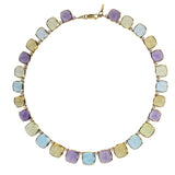 This stunning sugarloaf-cut gemstone necklace, featuring vibrant citrine, amethyst, and topaz, is expertly handcrafted in a luxurious design, blending playful charm with sophisticated elegance. Front Facing 