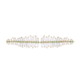 One-of-a-kind 14K yellow gold feather earrings featuring clear rock quartz, emeralds, and sparkling diamonds, designed for versatility—wear them as statement dangle earrings or transform the detachable feathers into a unique bracelet complemented by emerald stud earrings. Shown as bracelet.