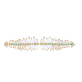 One-of-a-kind 14K yellow gold feather earrings featuring clear rock quartz, emeralds, and sparkling diamonds, designed for versatility—wear them as statement dangle earrings or transform the detachable feathers into a unique bracelet complemented by emerald stud earrings. Shown as bracelet. 