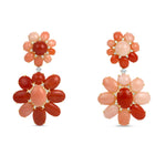 Exquisite 18K yellow gold convertible earrings featuring radiant coral and dazzling diamonds, offering two stunning looks—wear as refined studs or attach the elegant drops for a bold statement. Close up of front detail. 