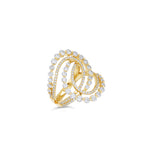 Stunning cosmic swirl ring crafted in 14K yellow gold, featuring graduated and tapered diamonds set in interlocking loops, combining luxury, craftsmanship, and timeless sophistication. Front view close cup of ring. 