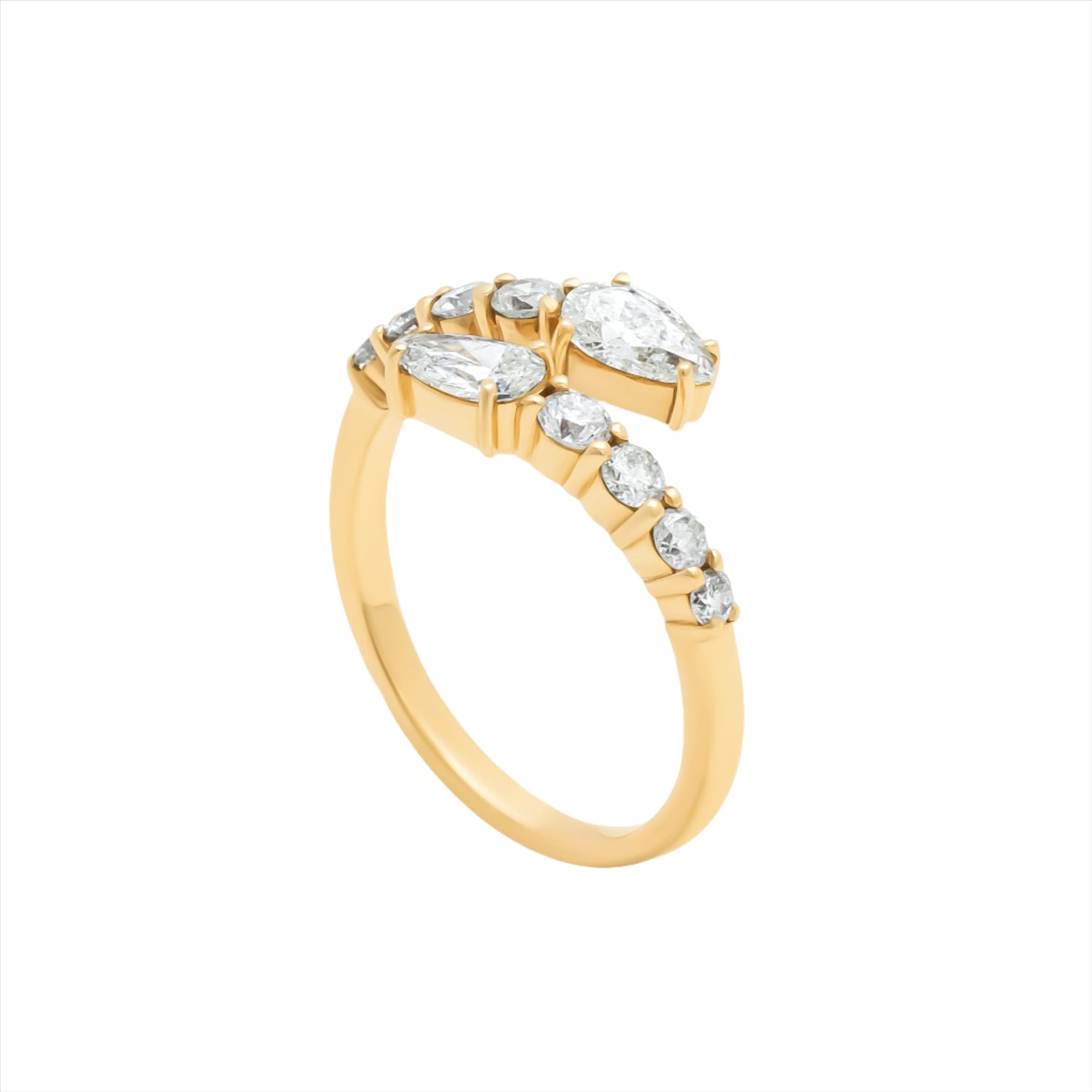 Elegant 14K yellow gold bypass ring featuring 1.2ct of G-H VS diamonds, including pear-shaped ends and graduated solitaires, creating a radiant flurry effect with a graceful silhouette.