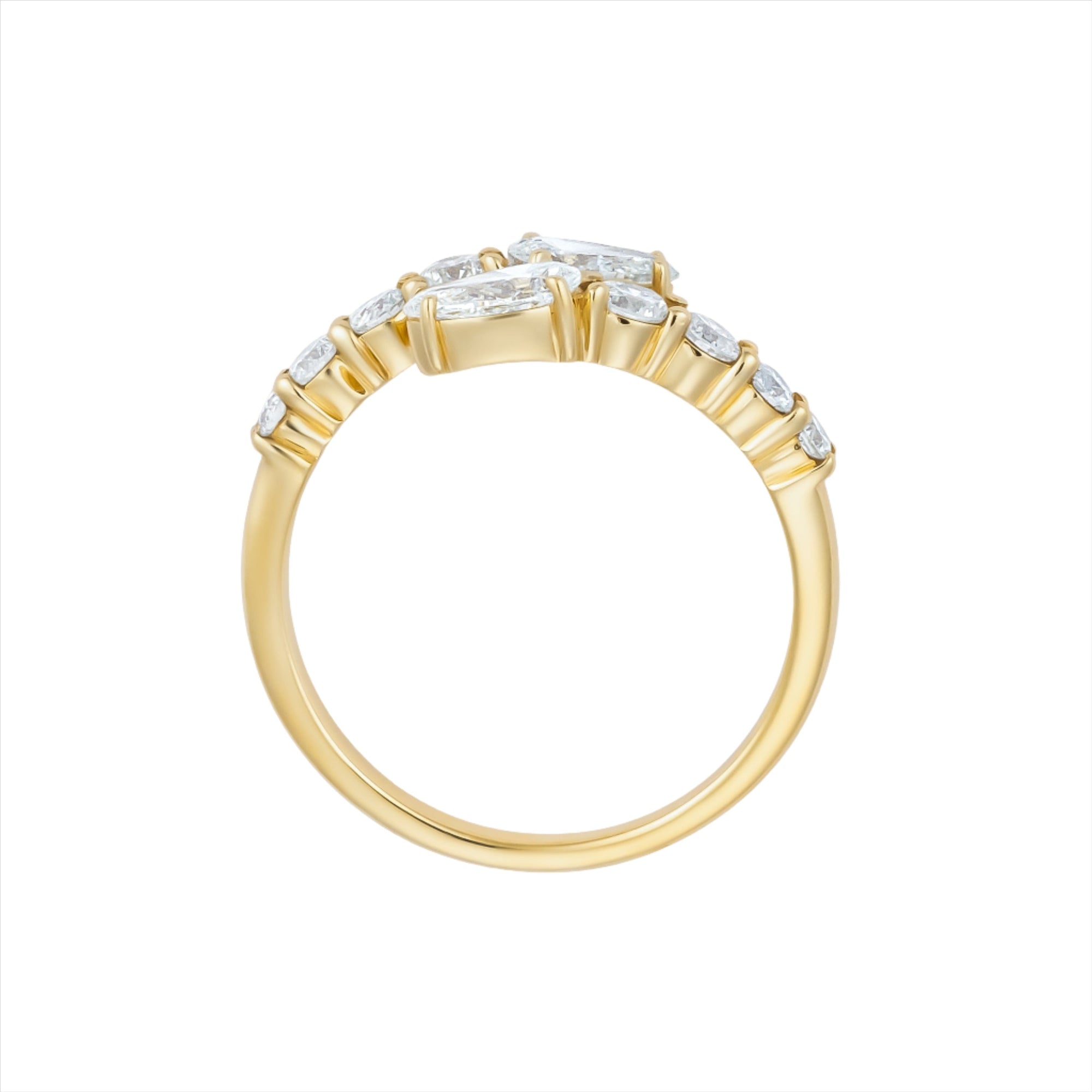 Elegant 14K yellow gold bypass ring featuring 1.2ct of G-H VS diamonds, including pear-shaped ends and graduated solitaires, creating a radiant flurry effect with a graceful silhouette.
