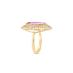 Art Deco-inspired 18K yellow gold ring featuring a radiant marquise-cut pink tourmaline encircled by a sparkling double diamond halo, meticulously crafted for timeless elegance and sophistication. Close up side, zoomed. 