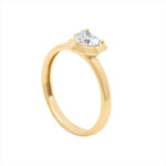 Modern deco 14K yellow gold ring featuring a 0.54ct G-H VS heart-shaped diamond in a sleek prong setting, blending vintage romance with bold contemporary style.