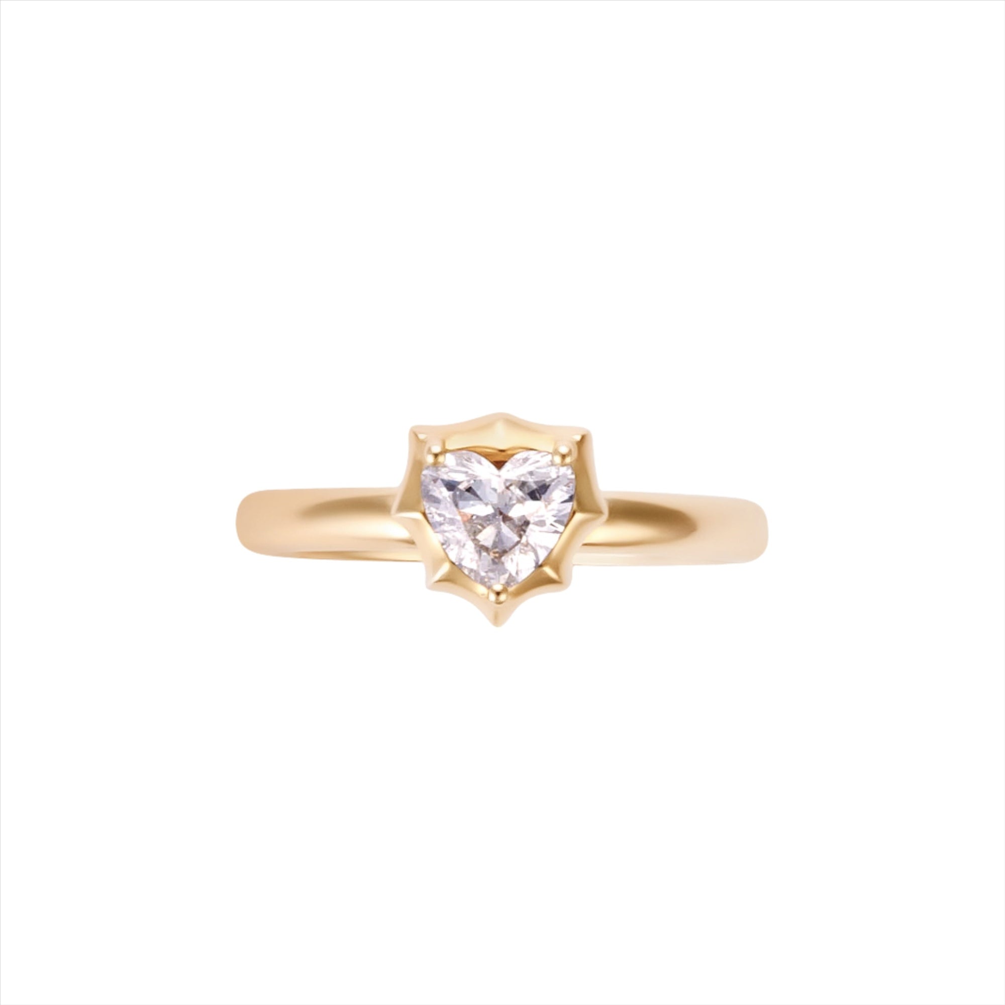 Modern deco 14K yellow gold ring featuring a 0.54ct G-H VS heart-shaped diamond in a sleek prong setting, blending vintage romance with bold contemporary style.