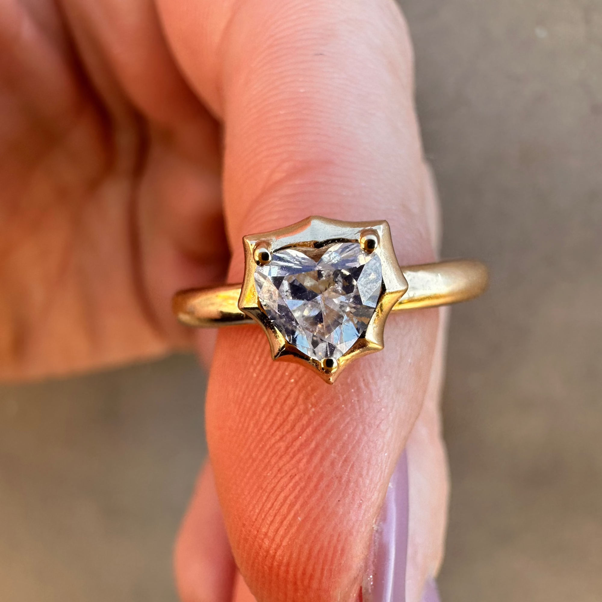 Modern deco 14K yellow gold ring featuring a 0.54ct G-H VS heart-shaped diamond in a sleek prong setting, blending vintage romance with bold contemporary style.