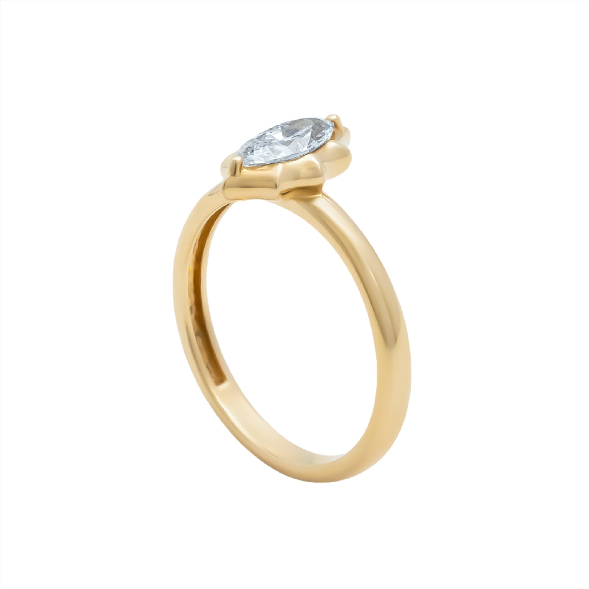 Modern deco-inspired 14K yellow gold ring featuring a sleek 0.56ct G-H VS marquise-cut diamond in a striking starburst design, offering a unique and refined statement silhouette.